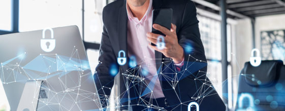 Man Holding Phone with Locks Displayed on Screen for Cloud IT Services in Abington, Cheltenham, Hamilton, King of Prussia, Levittown, Trenton