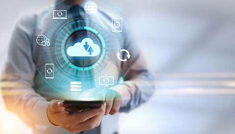 Man Holding Tablet with Screen of Clouds for Managed IT in Hamilton, NJ