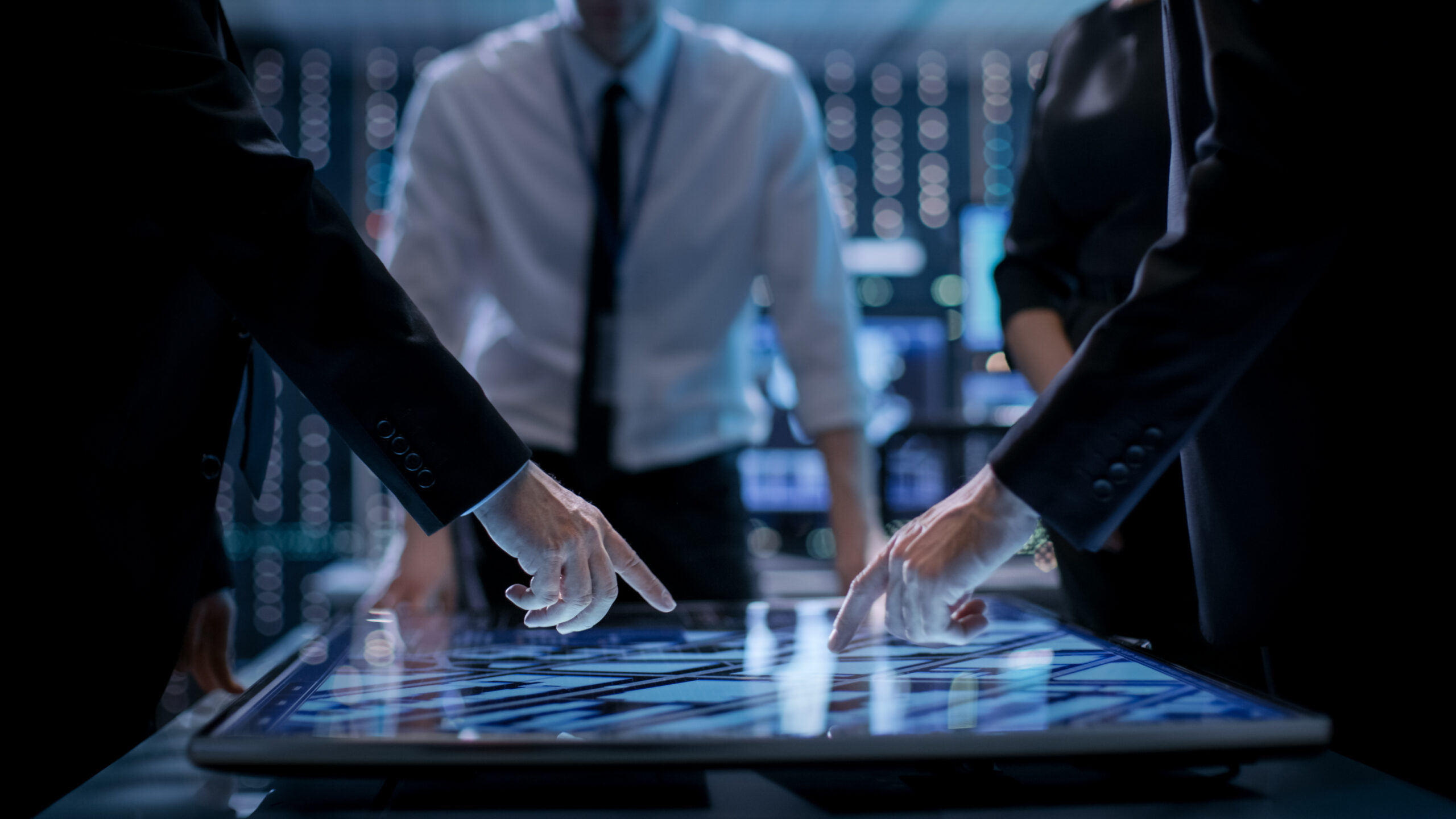 People Working at a Table for Managed IT in Hamilton, NJ