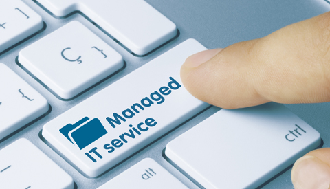 A Finger Pressing a Managed IT Services Button in King of Prussia, PA Office